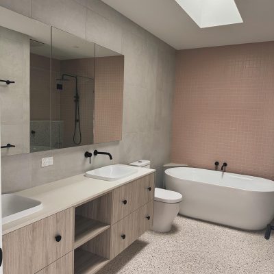 Modern bathroom renovation with frameless shower